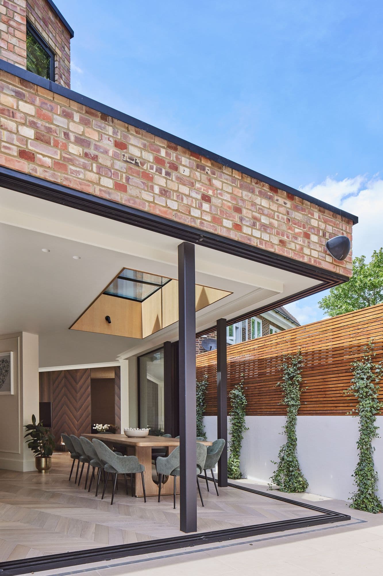 Modern exterior with brick and timber